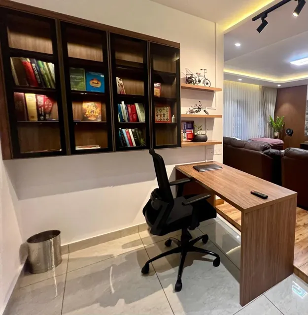 A small library with a work desk