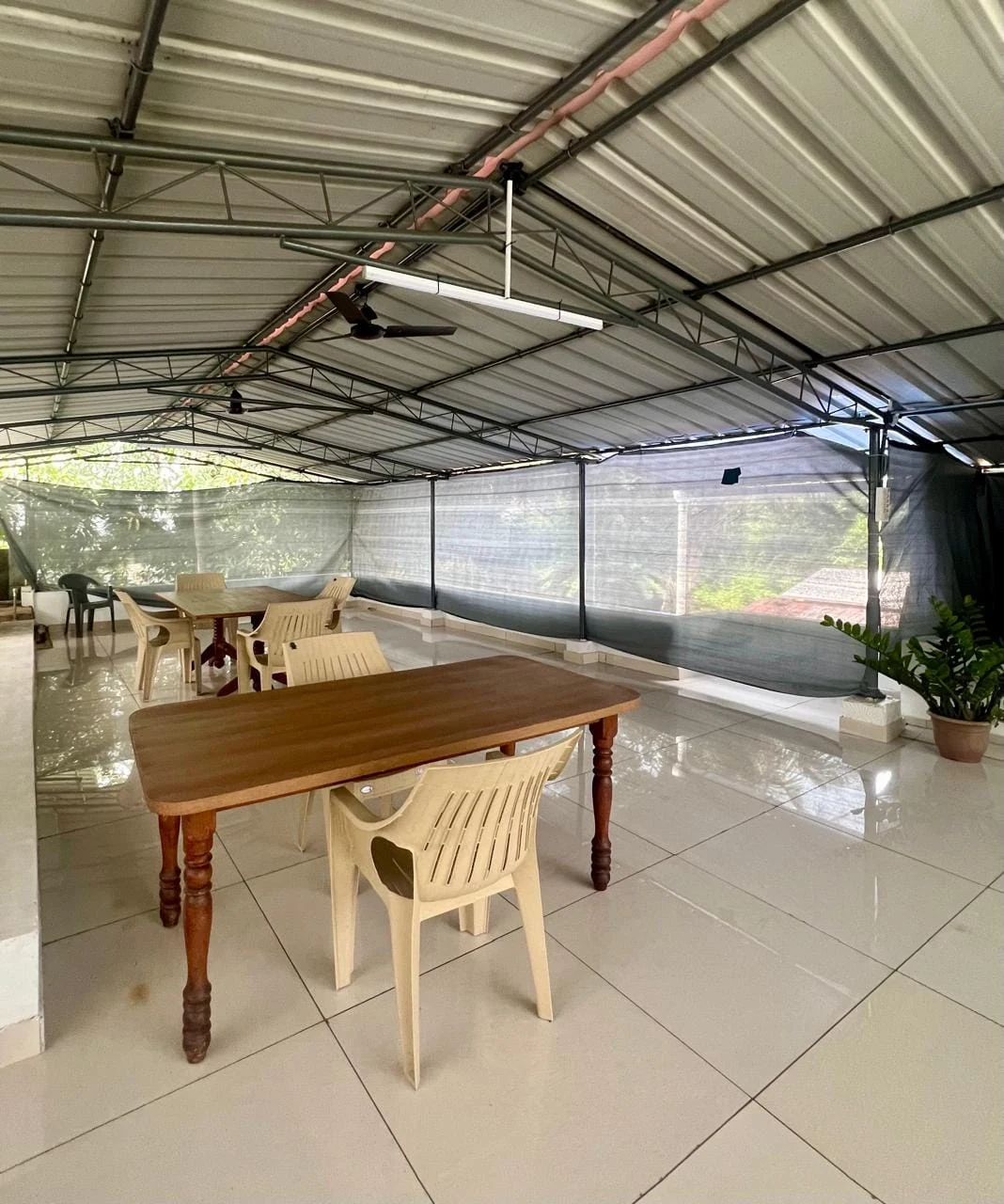 Dining tables on the covered terrace