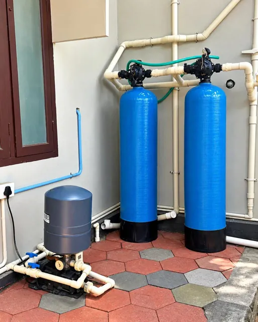 Twin water-filtration tanks and pressure pump